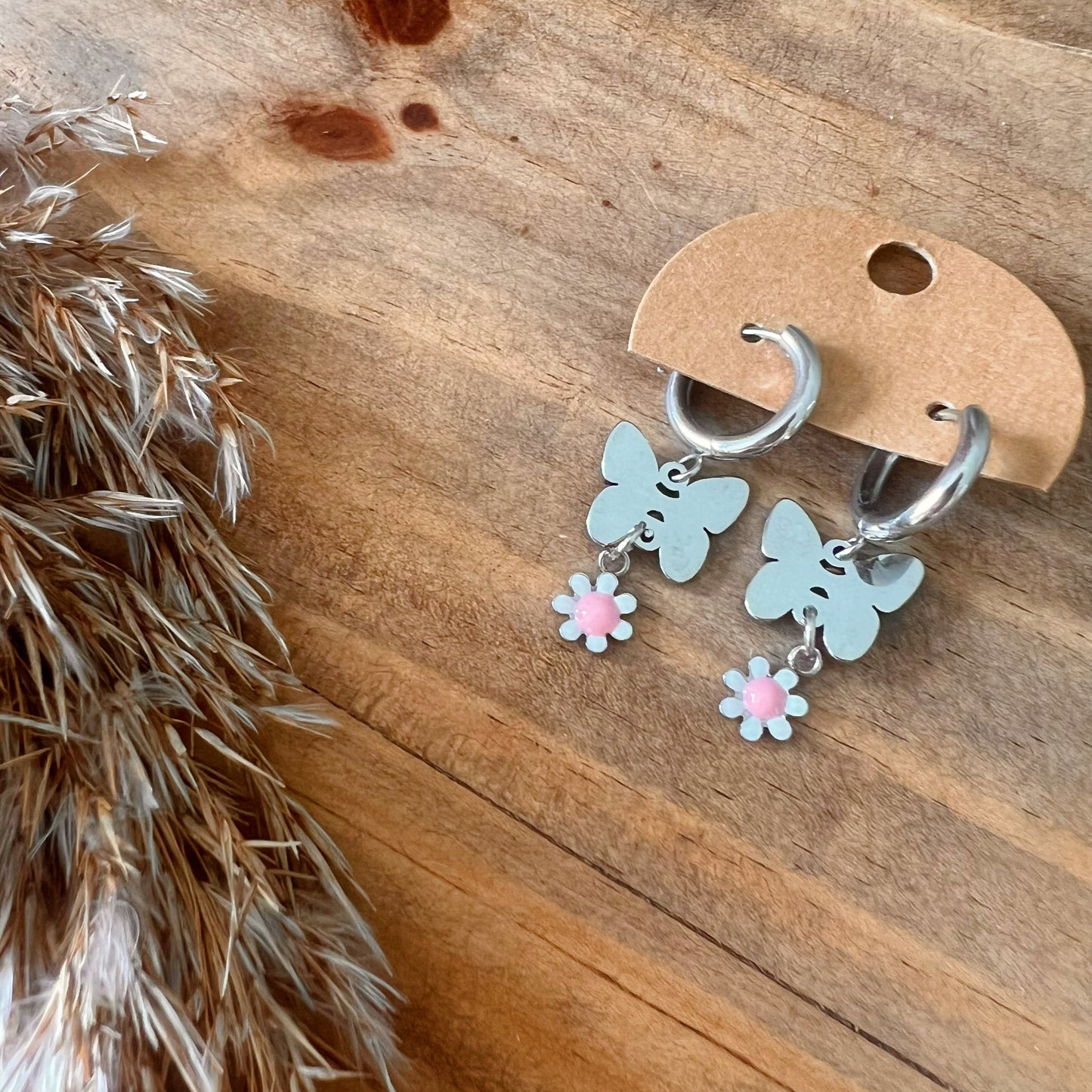 Boucles d’oreilles anneau , papillon et fleurs