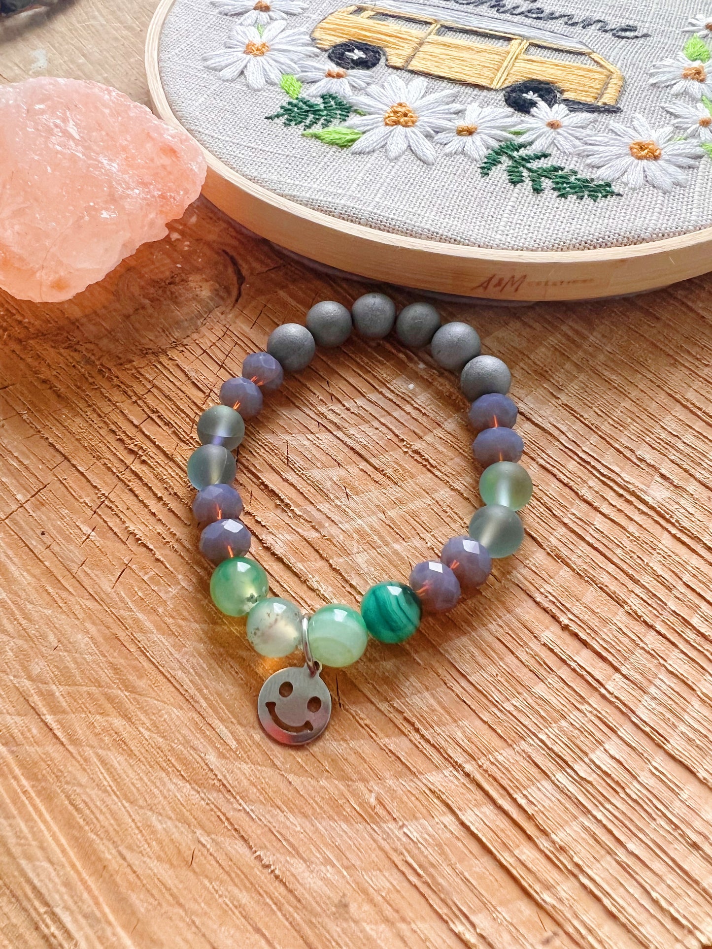 Bracelet magique - Smiley face gris